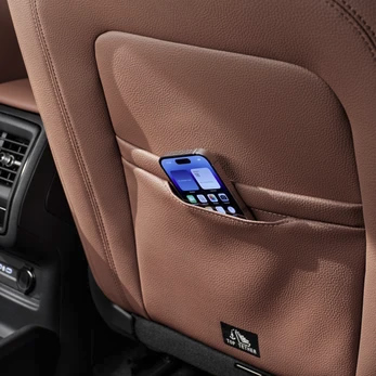 Smartphone holder pocket in front seat